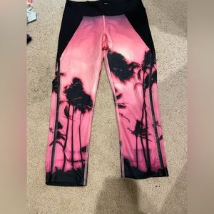 soft pink leggings with palm trees on them